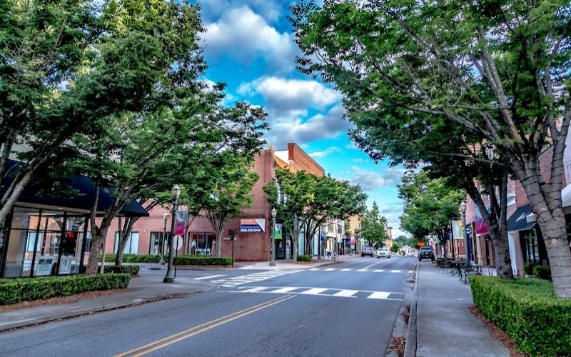 a street with trees on both sides of it