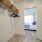 walk-closet with white walls and shelves