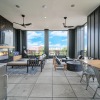 rooftop terrace with tables and chairs