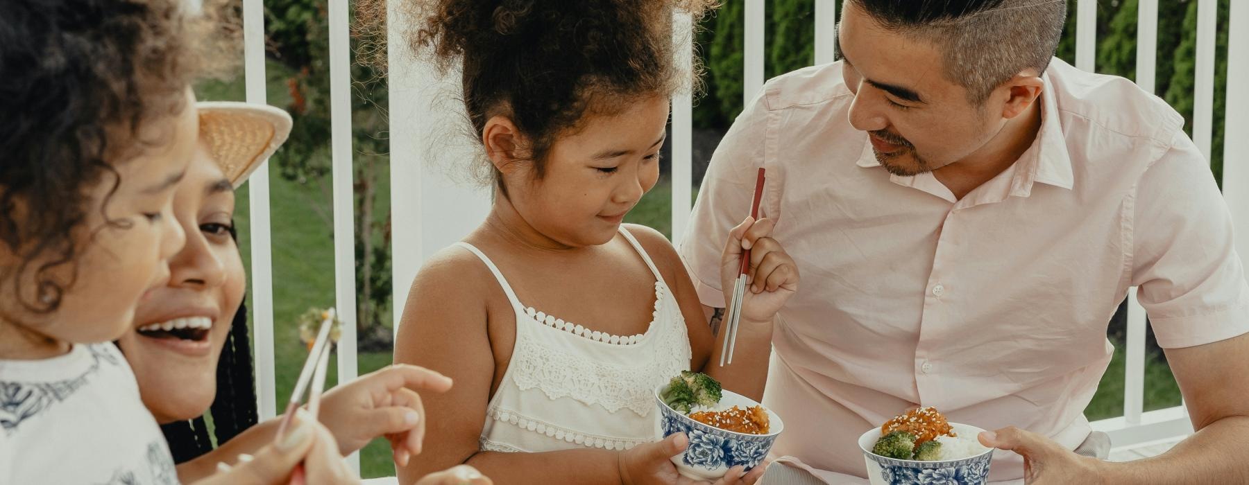 a man and a woman eating cake