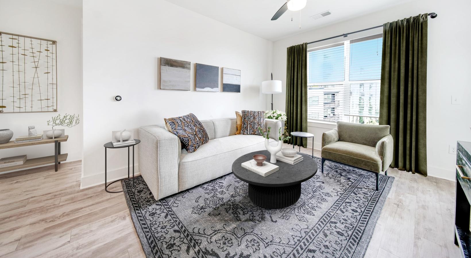 Beautiful living spaces with natural lighting a living room with a large window