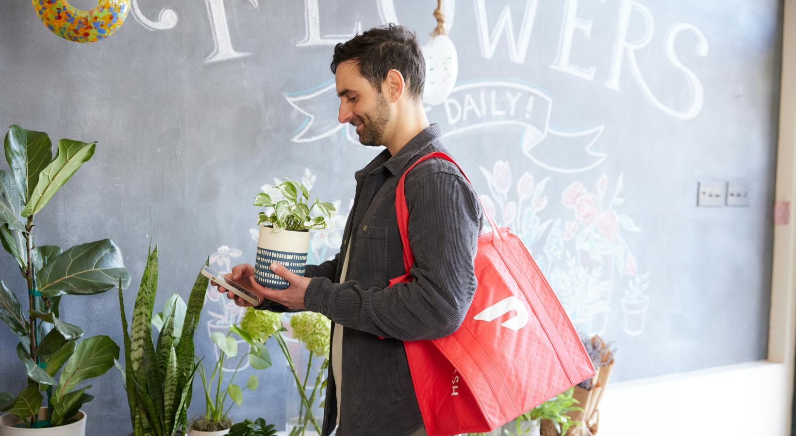 Settle into comfort at Exchange at Rock Hill Apartments a person holding a bag and a plant