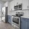 a kitchen with white cabinets